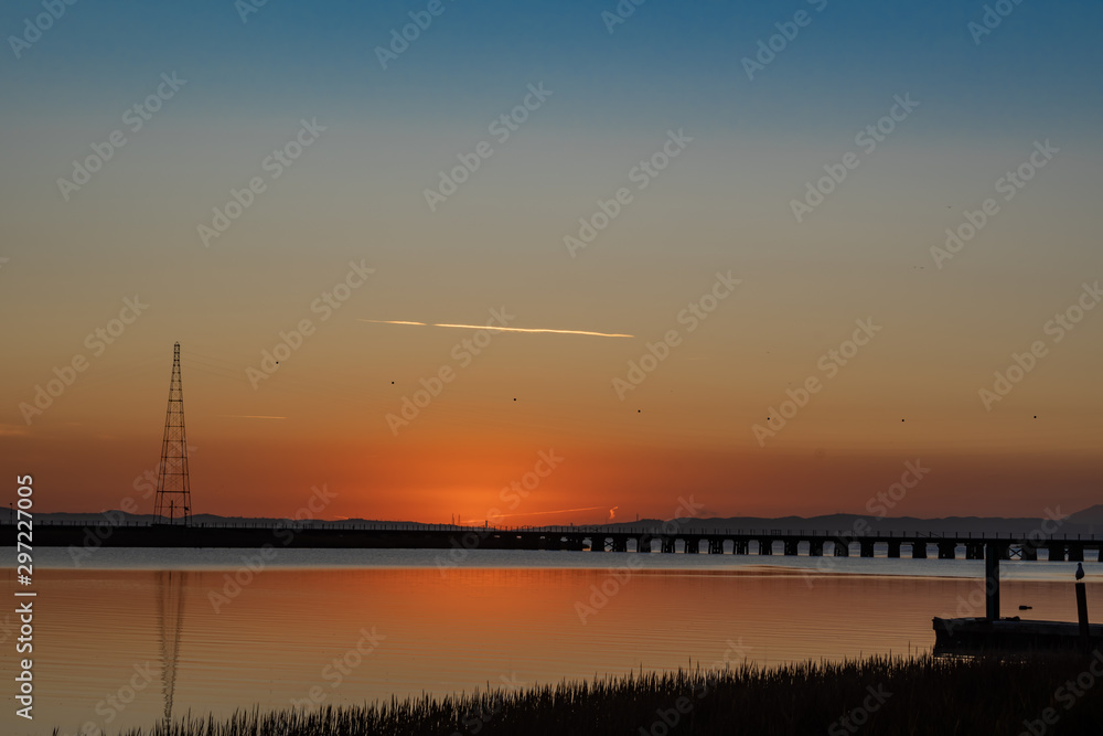 Sunrise over the Napa river along the railroad bridge