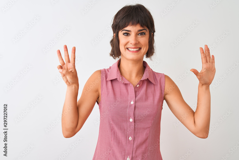 Young beautiful woman wearing red summer shirt standing over isolated white background showing and pointing up with fingers number eight while smiling confident and happy. Young beautiful woman wearing red summer shirt standing over isolated white background showing and pointing up with fingers number eight while smiling confident and happy.