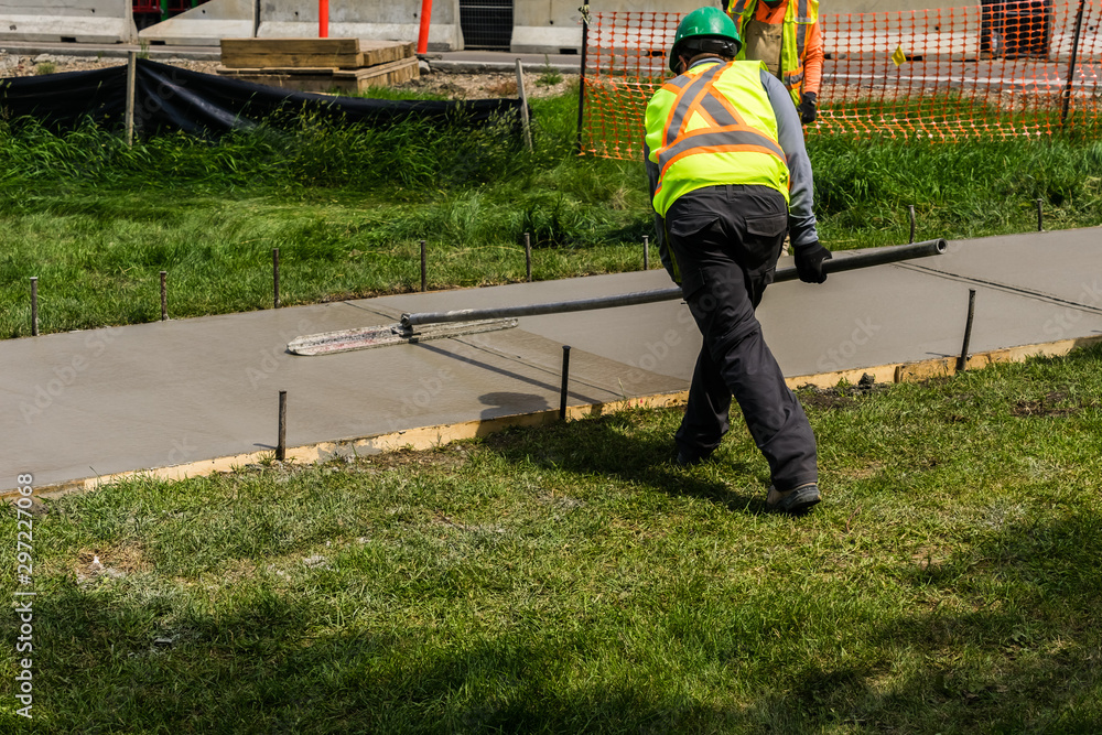 Sidewalk finishing work Sidewalk finishing work