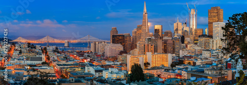San Francisco skyline panorama at dusk with Bay Bridge and downtown skyline