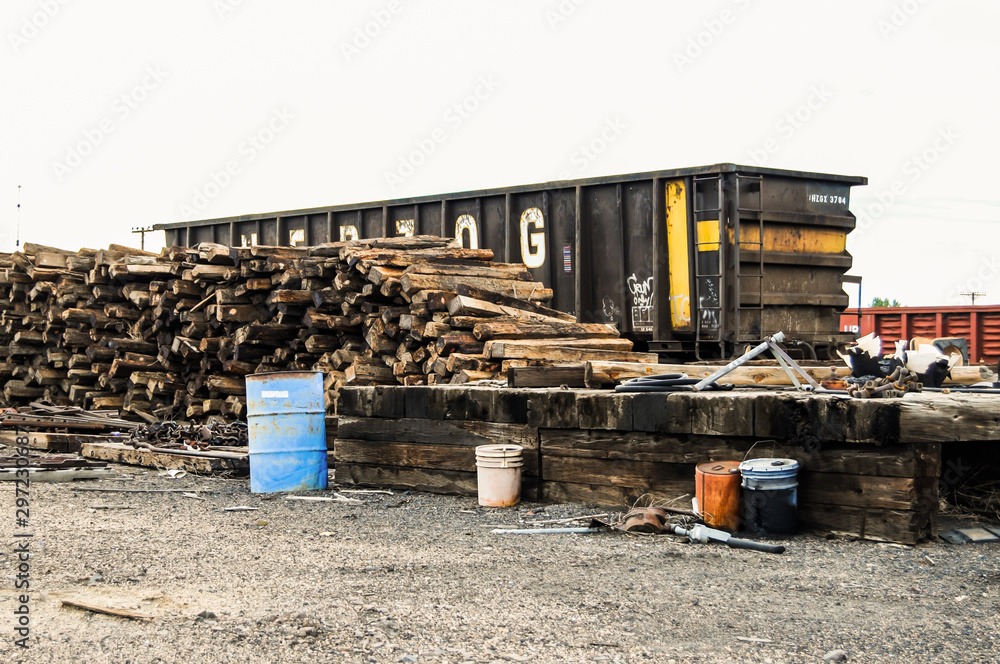 Worn out ties stacked in the railyard in a cluster. Worn out ties stacked in the railyard in a cluster.