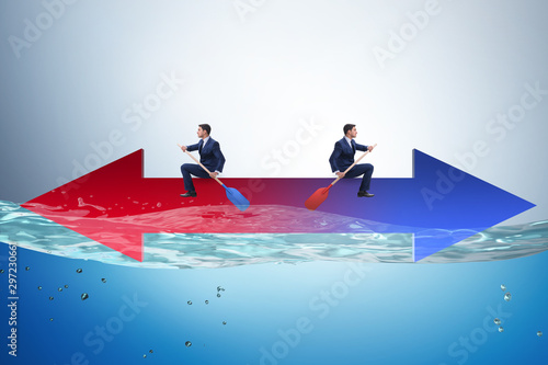Quadro em tela Disagreement concept with businessmen rowing in different direct