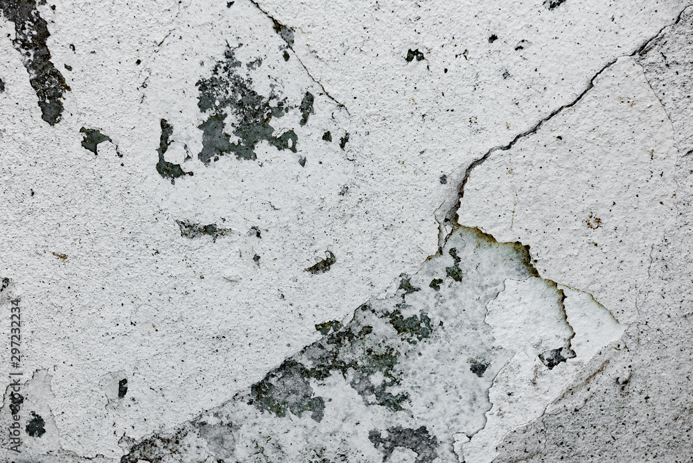 Obraz premium Texture of a concrete wall with cracks and scratches which can be used as a background