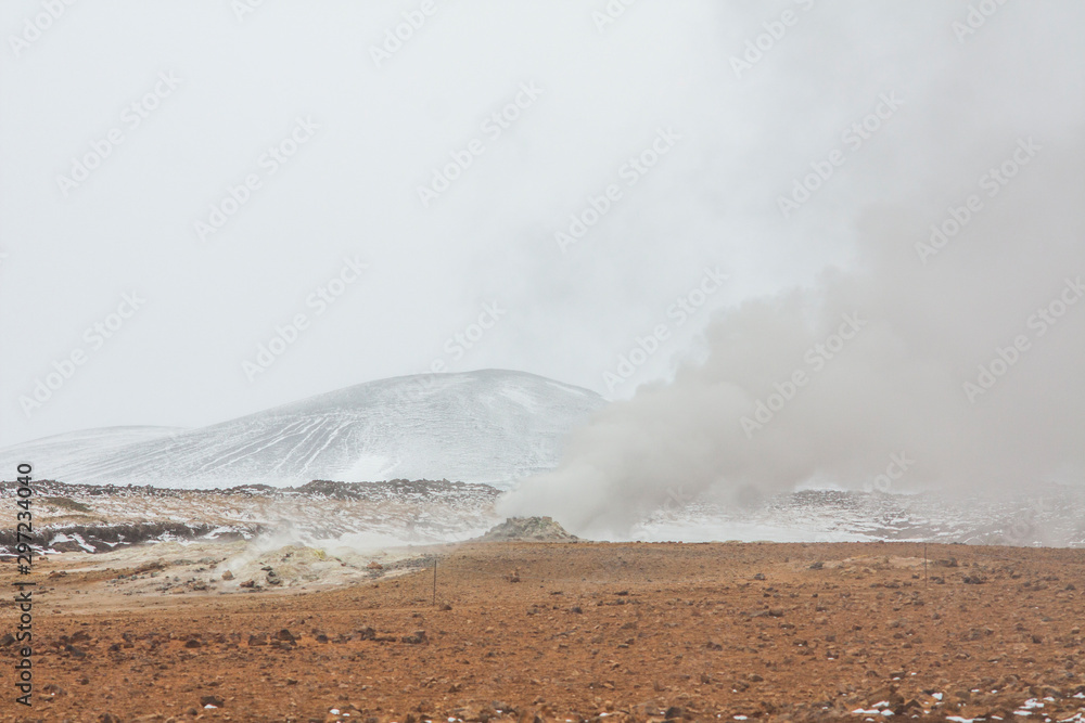 Panorama of geothermal area Hverarönd (Hverir), situated by the orange-red clay coloured tuff mountain Namafjall south of Námaskarð in Iceland, with details and patterns Panorama of geothermal area Hverarönd (Hverir), situated by the orange-red clay coloured tuff mountain Namafjall south of Námaskarð in Iceland, with details and patterns