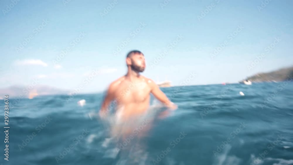 Swimming Man On Blue Sea Underwater.Underwater Man Swimming In Slow Motion With Air Bubbles.Air Bubbles In Water.Water Drops Falling And Splashing On Glassy Water Surface Blue Ocean. Swimming Man On Blue Sea Underwater.Underwater Man Swimming In Slow Motion With Air Bubbles.Air Bubbles In Water.Water Drops Falling And Splashing On Glassy Water Surface Blue Ocean.