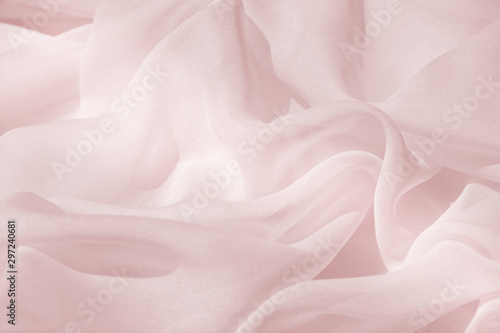 Light draped chiffon fabric in pink for festive backgrounds photo