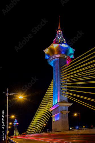 Maha Chesadabodindranusorn Bridge is one of the most beautiful bridge. The top of pillar is a lotus-shaped design. The bridge structure is mixed between cable and concrete bridge in Thailand. photo