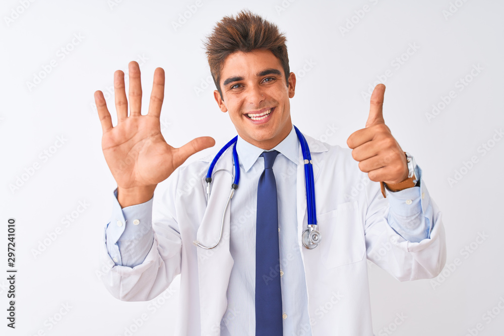 Young handsome doctor man wearing stethoscope over isolated white background showing and pointing up with fingers number six while smiling confident and happy. Young handsome doctor man wearing stethoscope over isolated white background showing and pointing up with fingers number six while smiling confident and happy.