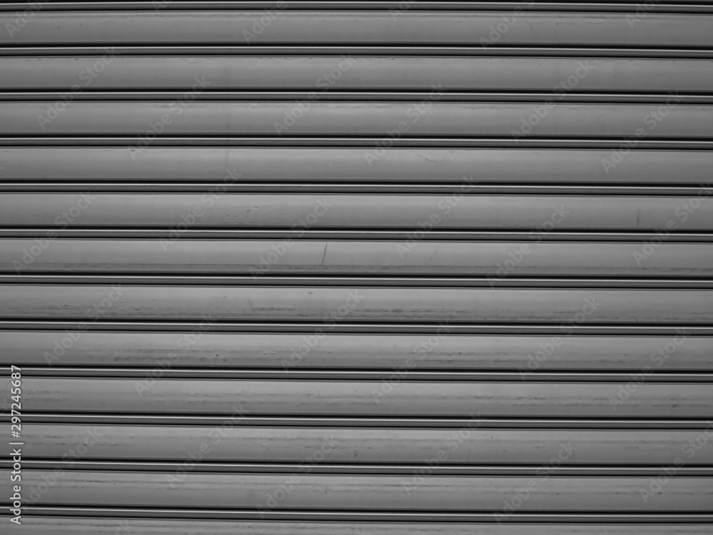 Abstract black and white tone background horizontal striped pattern of old metal wall or floor texture.