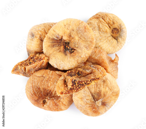 Pile of tasty dried figs on white background, top view