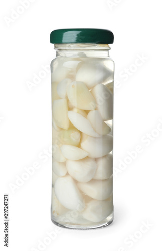 Jar with pickled garlic on white background