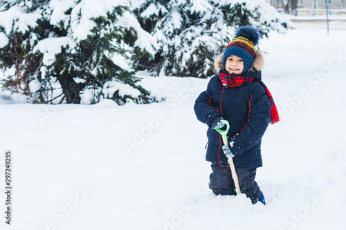 Boy played in the winter on the street
