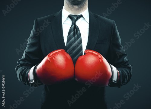 Businessman in red boxing gloves © peshkova