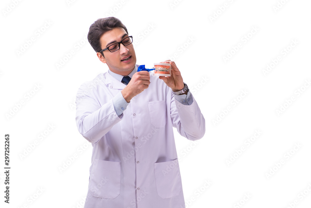 Young male doctor stomatologist isolated on white Young male doctor stomatologist isolated on white