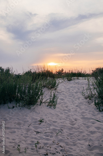 sunset on white sand sea beach