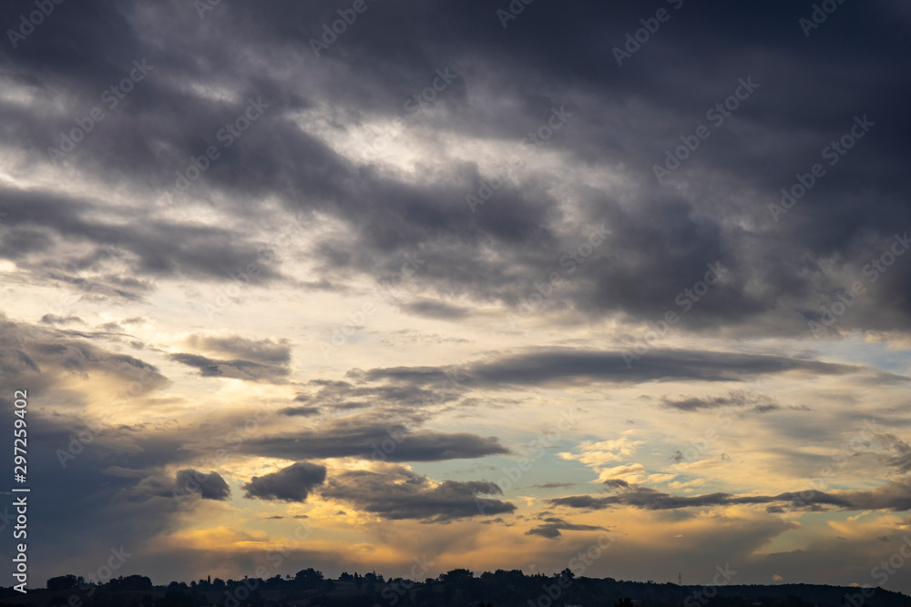 cloudy sky with clouds at sunrise