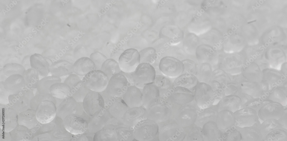 Polypropylene granule close-up background texture. Polypropylene granule close-up background texture.