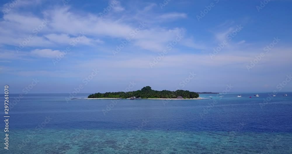 aerial view of island in light blue cloud and sea aerial view of island in light blue cloud and sea