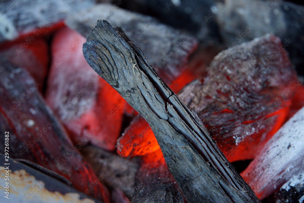 Fototapeta premium Glowing charcoal with red light of Korean bbq restaurant