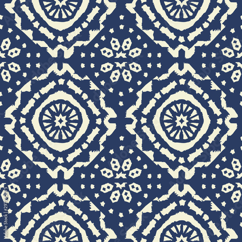 Abstract indigo shibori seamless vector pattern with ikat print of mosaic