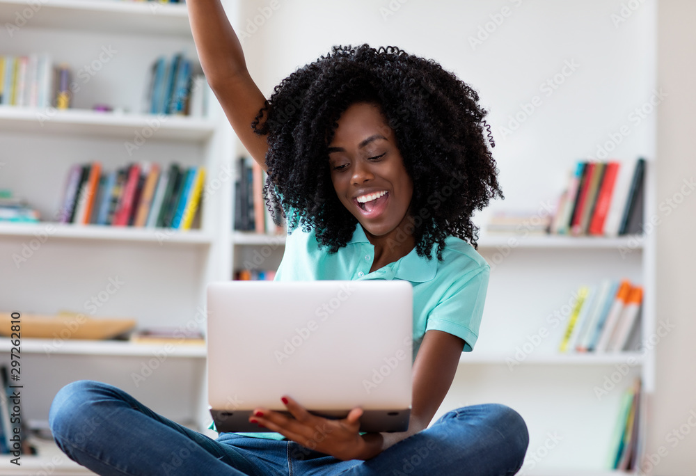 Cheering african americahn woman gets a special offer online Cheering african americahn woman gets a special offer online