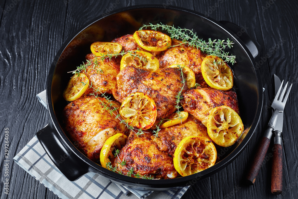 baked Chicken Thighs in a dutch oven - obrazy, fototapety, plakaty 