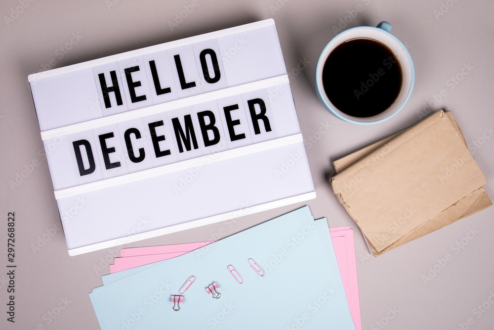 Hello December. Winter, New Year and Christmas, gift buying and discounts concept Hello December. Winter, New Year and Christmas, gift buying and discounts concept