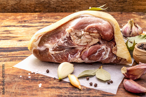 Raw pork meat - hock, knuckle or leg. Traditional ingredient for eisbein. Fresh meat, dry spices and vegetables