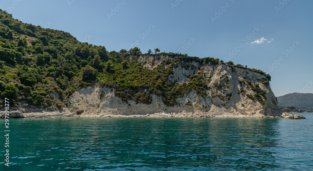 rocky cliff with bushes on zakynthos