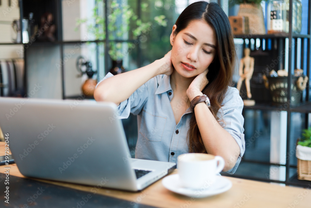 Asian woman working and drink coffee in cafe with laptop computer smile and happy work Asian woman working and drink coffee in cafe with laptop computer smile and happy work
