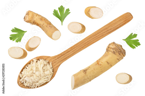 Fotografie, Tablou Horseradish root grated in spoon with slices isolated on white background