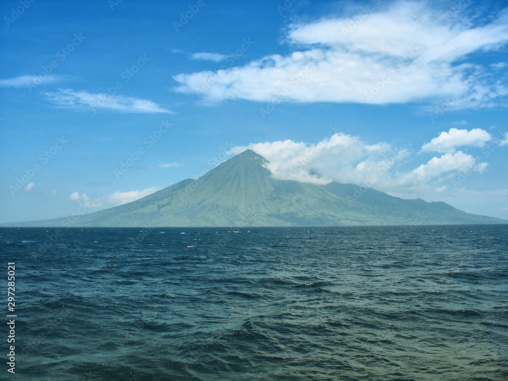 Ring of Fire Indonesia - Sangeang volcano island on the sea Ring of Fire Indonesia - Sangeang volcano island on the sea