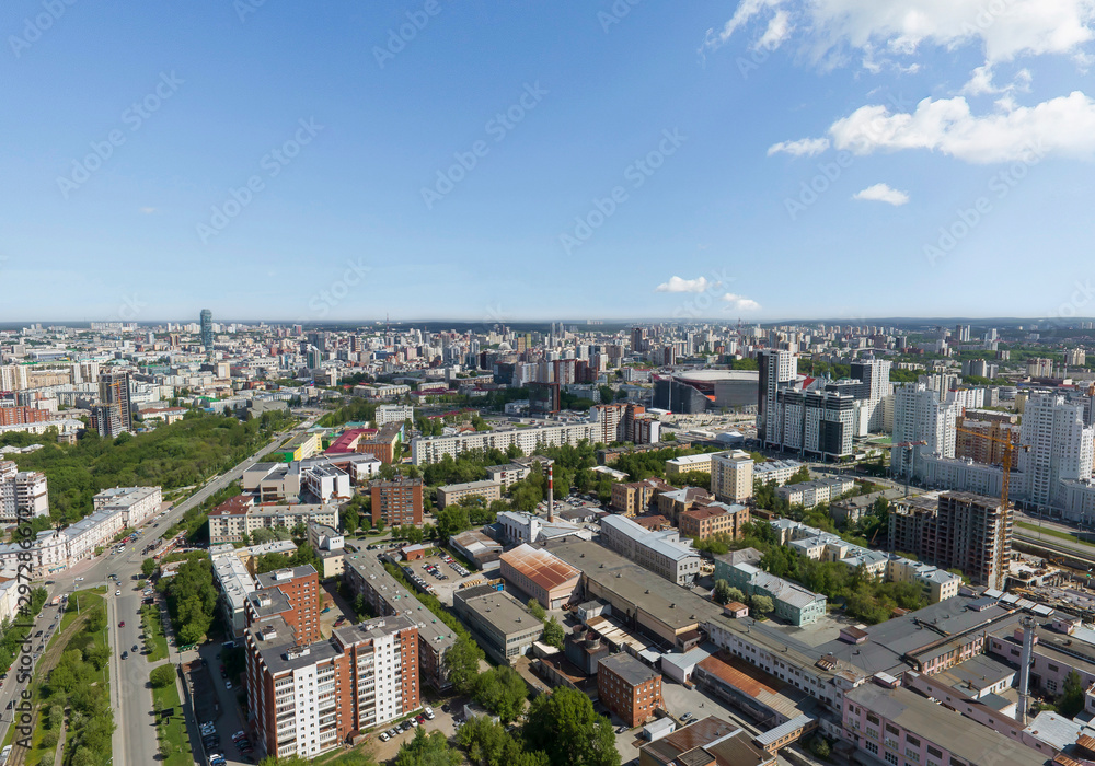 Summer city and Industrial Zone, a lot of trees, aerial view. Ekaterinburg, Verkh-Isetsky district, Russia