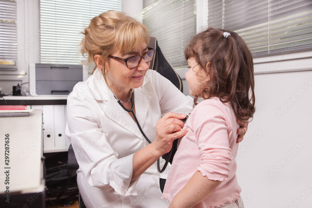 Pediatrician is visiting a child Pediatrician is visiting a child