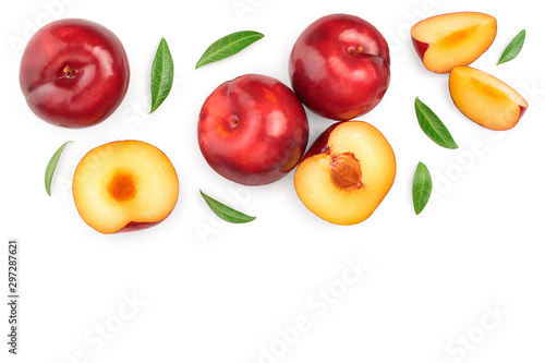 fresh red plum and half with leaves isolated on white background with copy space for your text. Top view. Flat lay
