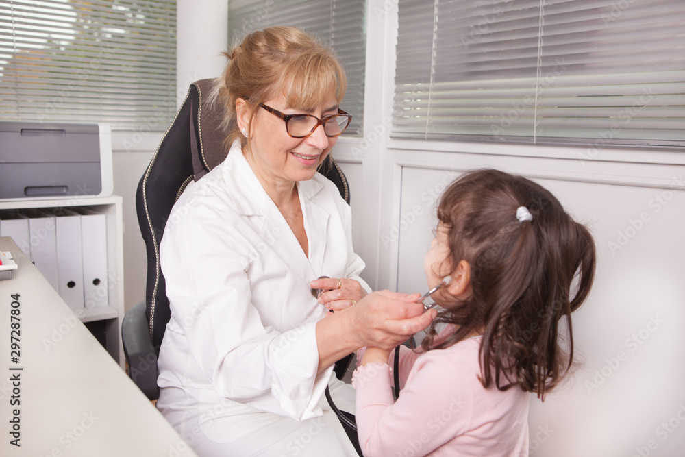 Pediatrician is visiting a child Pediatrician is visiting a child