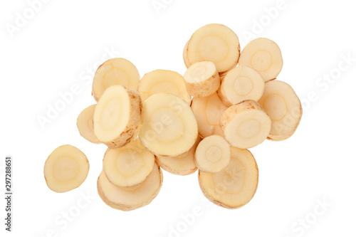 Parsnip root slices isolated on white background closeup. Top view. Flat lay