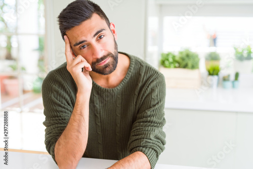 Handsome man looking relaxed and confident