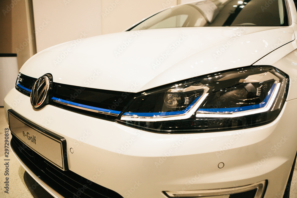 Berlin, October 2, 2017: Group Forum - auto show in Berlin. Close-up - the  front of the white car with the company logo. New e-golf Stock Photo |  Adobe Stock