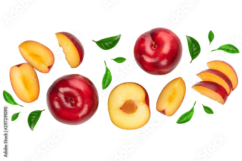 fresh red plum and half isolated on white background. Top view. Flat lay