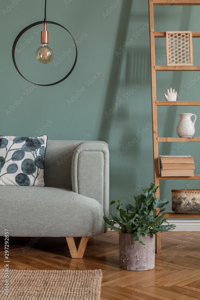 Modern composition of living room interior at apartment with mint sofa, wooden ladder, plants, pillow, lamp and elegant accessories. Stylish home decor. Template. Eucalyptus color concept. - obrazy, fototapety, plakaty 