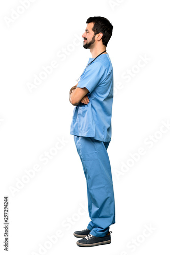 Full-length shot of Surgeon doctor man in lateral position over isolated white background