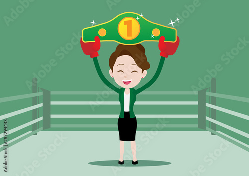 Business woman in boxing gloves holding championship belt standing on the boxing ring
