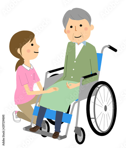 車椅子に乗る高齢者　介護スタッフ