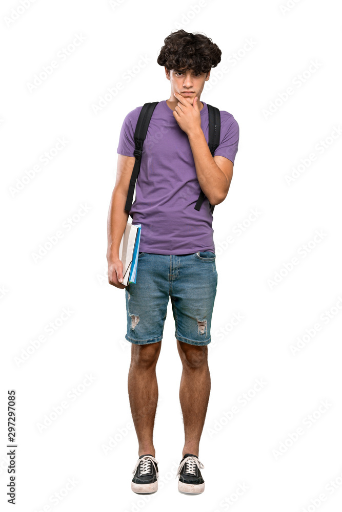 A full-length shot of a Young student man thinking over isolated white background