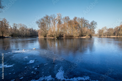 winter frozen river during sunny morning
