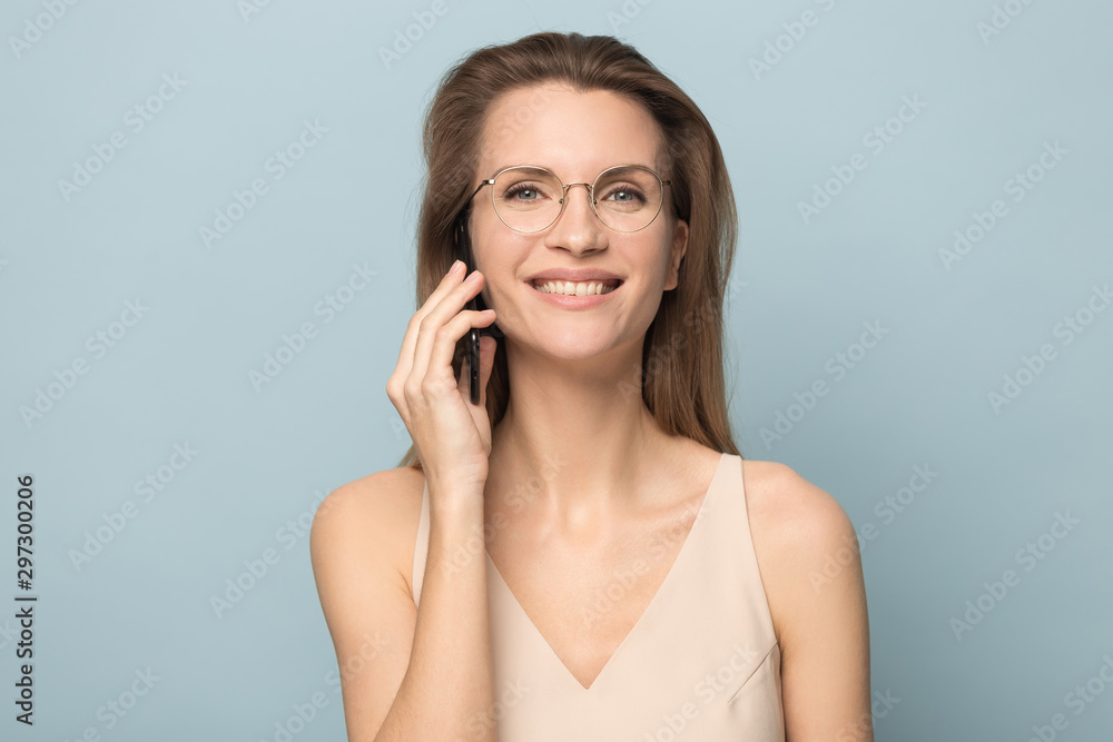 Happy millennial woman have pleasant talk on cellphone Happy millennial woman have pleasant talk on cellphone