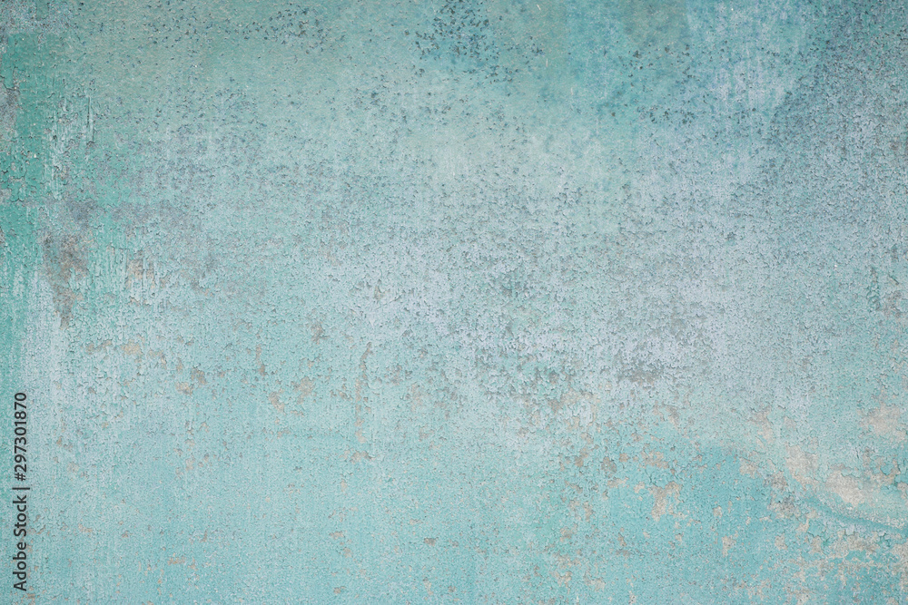Old metallic sheet with distressed blue chipping paint