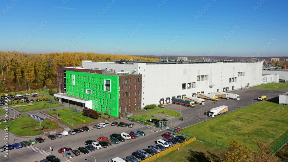 Modern Manufacturing Architecture. Aerial view of factory plant producing Modern Manufacturing Architecture. Aerial view of factory plant producing