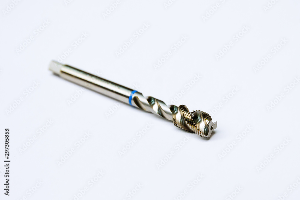 Tap for threading in metal. Tool for metal processing.